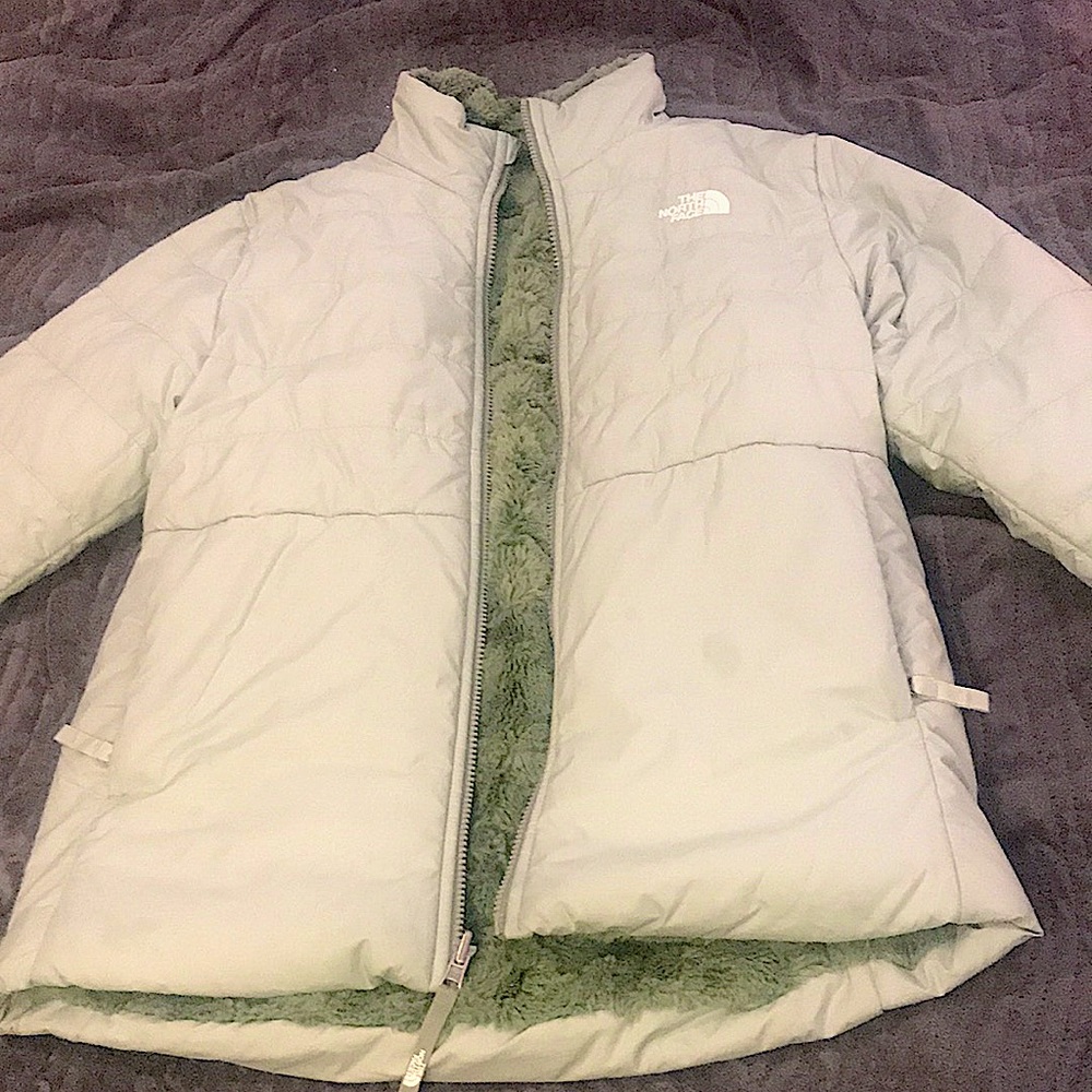 This is a name brand coat and is reversible good quality